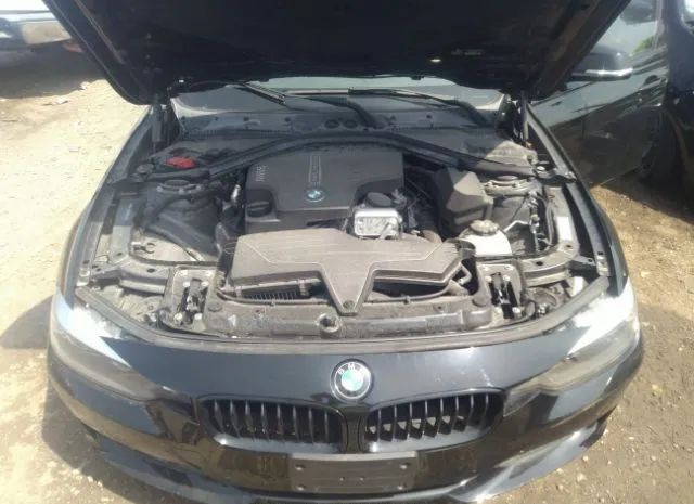 Photo 9 VIN: WBA3C3G5XFNT53037 - BMW 3 SERIES 