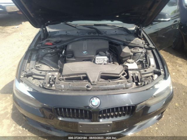 Photo 9 VIN: WBA3C3G5XFNT53037 - BMW 3 SERIES 