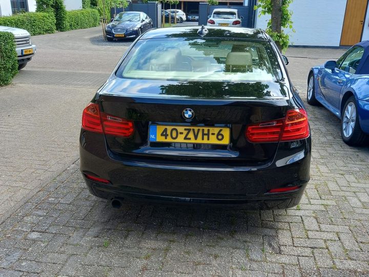 Photo 2 VIN: WBA3J91010J797993 - BMW 3-SERIE 