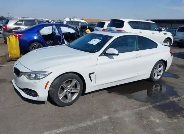 Photo 1 VIN: WBA3N7C50FK224376 - BMW 4ER 