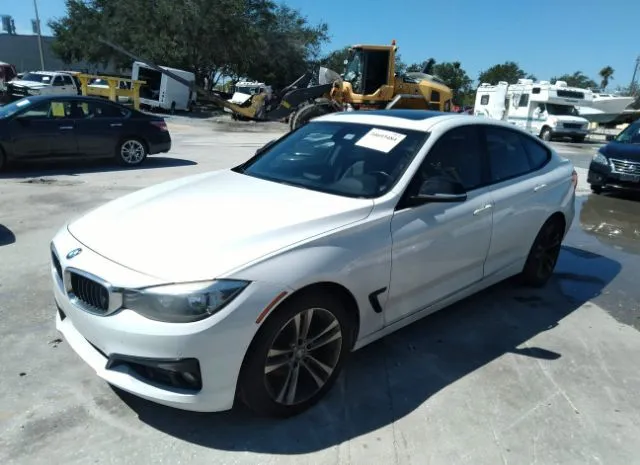 Photo 1 VIN: WBA3X5C57ED556638 - BMW 3 SERIES GRAN TURISMO 