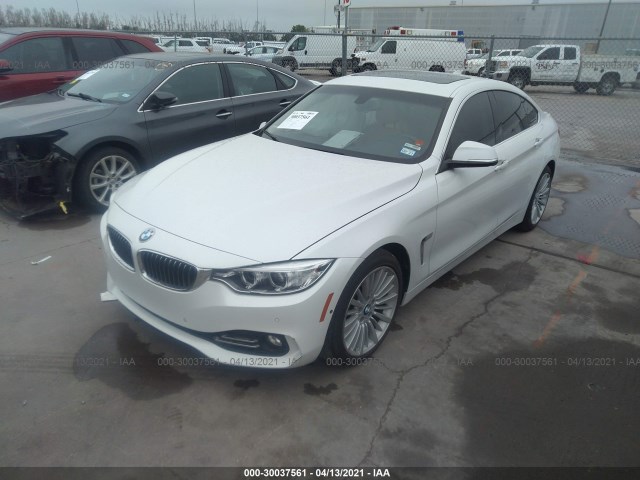 Photo 1 VIN: WBA4A5C55FG052384 - BMW 4 