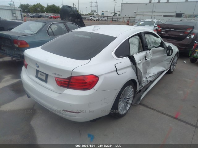 Photo 3 VIN: WBA4A5C55FG052384 - BMW 4 