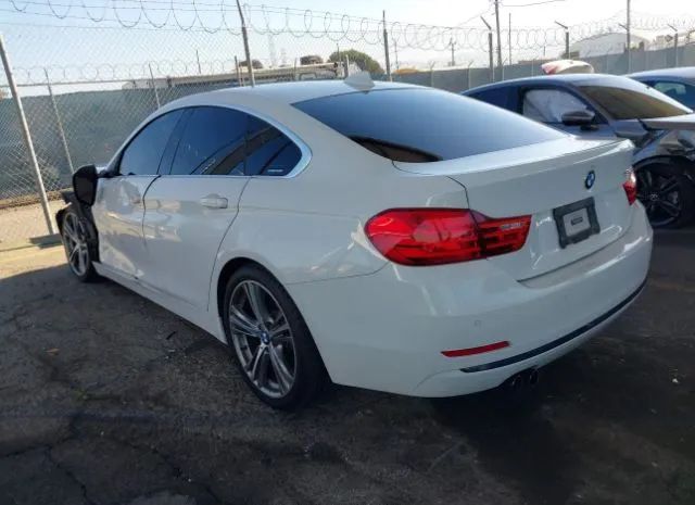 Photo 2 VIN: WBA4A9C52GG504882 - BMW 4 SERIES 