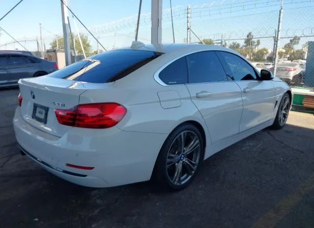 Photo 3 VIN: WBA4A9C52GG504882 - BMW 4 SERIES 