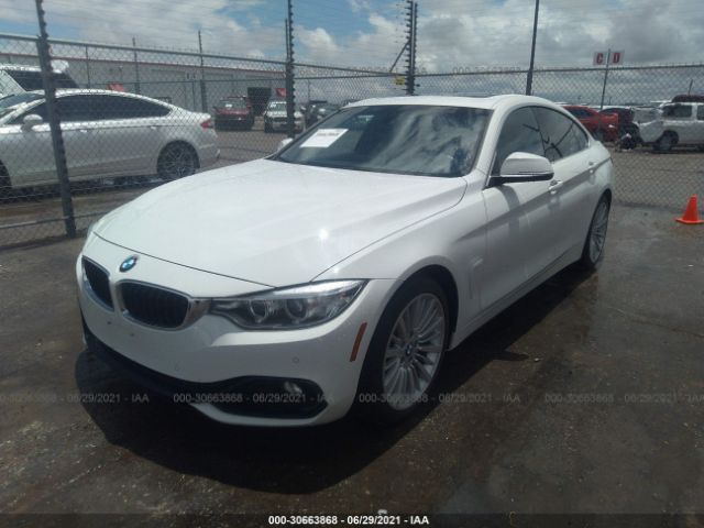 Photo 1 VIN: WBA4A9C54GG506410 - BMW 4 