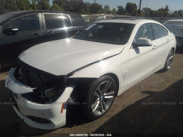 Photo 1 VIN: WBA4A9C56GGL87856 - BMW 4 