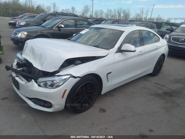 Photo 1 VIN: WBA4C9C57FG135560 - BMW 4 