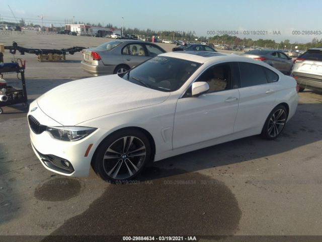 Photo 1 VIN: WBA4J1C03LBU68200 - BMW 4 