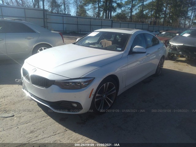 Photo 1 VIN: WBA4J1C03LBU68469 - BMW 4 