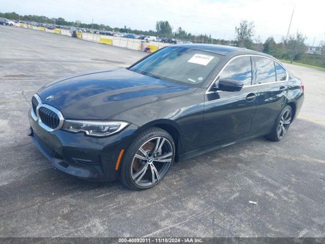 Photo 1 VIN: WBA5R1C50KAK11055 - BMW 330I 