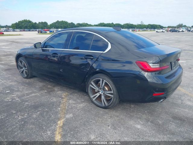 Photo 2 VIN: WBA5R1C50KAK11055 - BMW 330I 