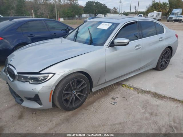 Photo 1 VIN: WBA5R1C53KFH11233 - BMW 330I 