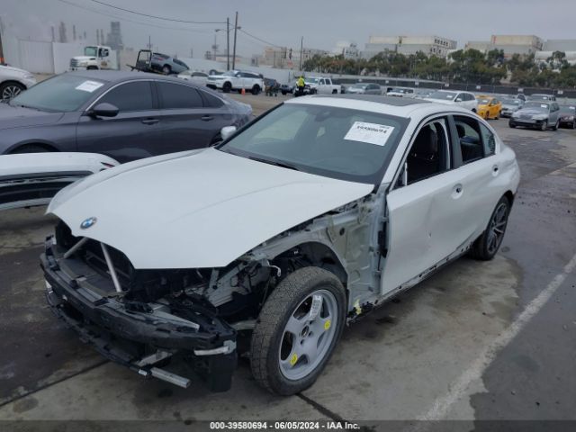 Photo 1 VIN: WBA5R1C55KAJ99002 - BMW 330I 