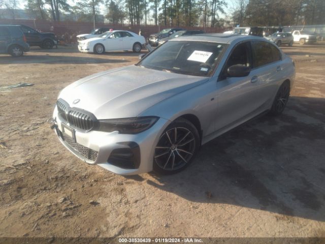 Photo 1 VIN: WBA5R1C58KAK07299 - BMW 330I 