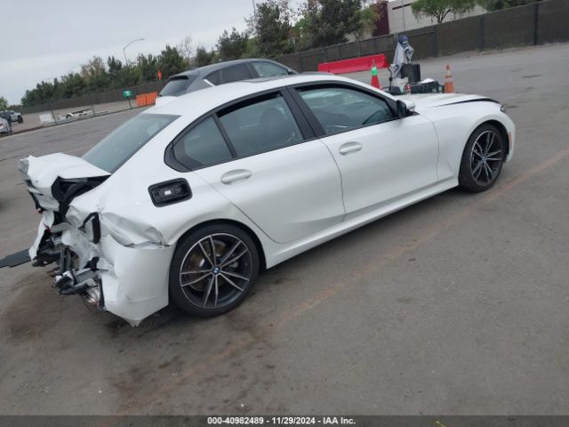 Photo 3 VIN: WBA5R1C59KAK07571 - BMW 330I 