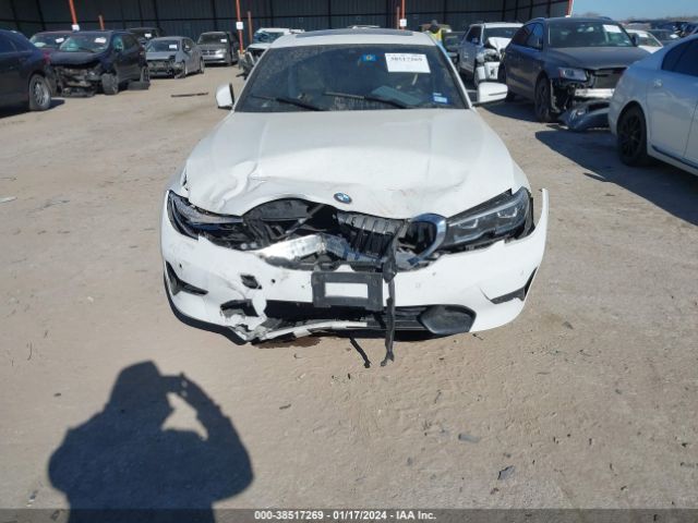 Photo 5 VIN: WBA5R1C5XKAJ99450 - BMW 330I 