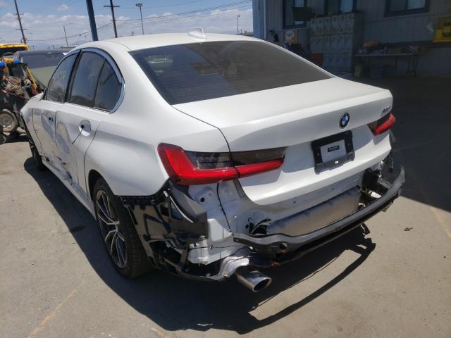 Photo 2 VIN: WBA5R1C5XKAK08132 - BMW 330I 