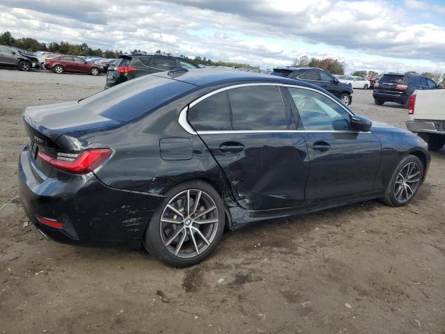 Photo 2 VIN: WBA5R7C5XKAJ80626 - BMW 330XI 