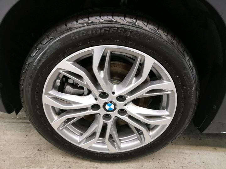 Photo 12 VIN: WBA71AA0005P97785 - BMW X1 