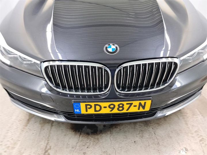 Photo 11 VIN: WBA7D01020GJ45756 - BMW 740 