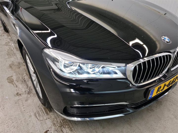 Photo 32 VIN: WBA7D01040GJ46116 - BMW 740 