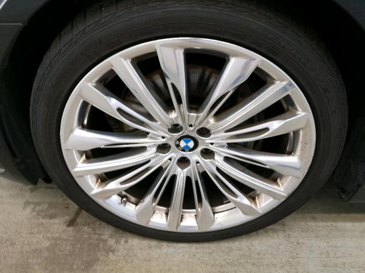 Photo 12 VIN: WBA7D01050GJ35500 - BMW 740 