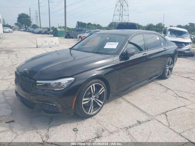 Photo 1 VIN: WBA7E2C32HG740943 - BMW 740I 