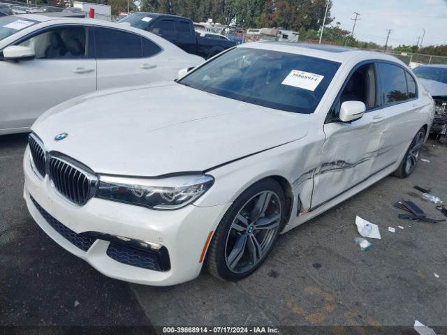 Photo 1 VIN: WBA7E2C56JB214884 - BMW 740I 