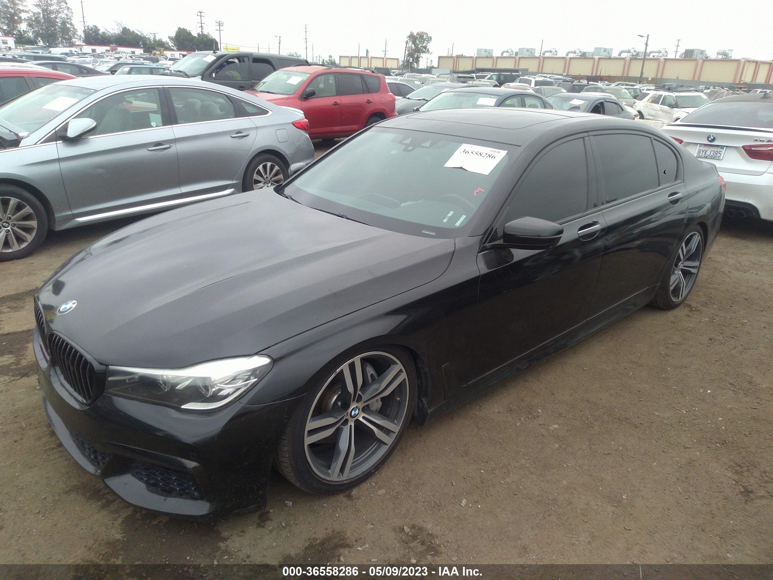 Photo 1 VIN: WBA7E2C57KB217651 - BMW 7ER 