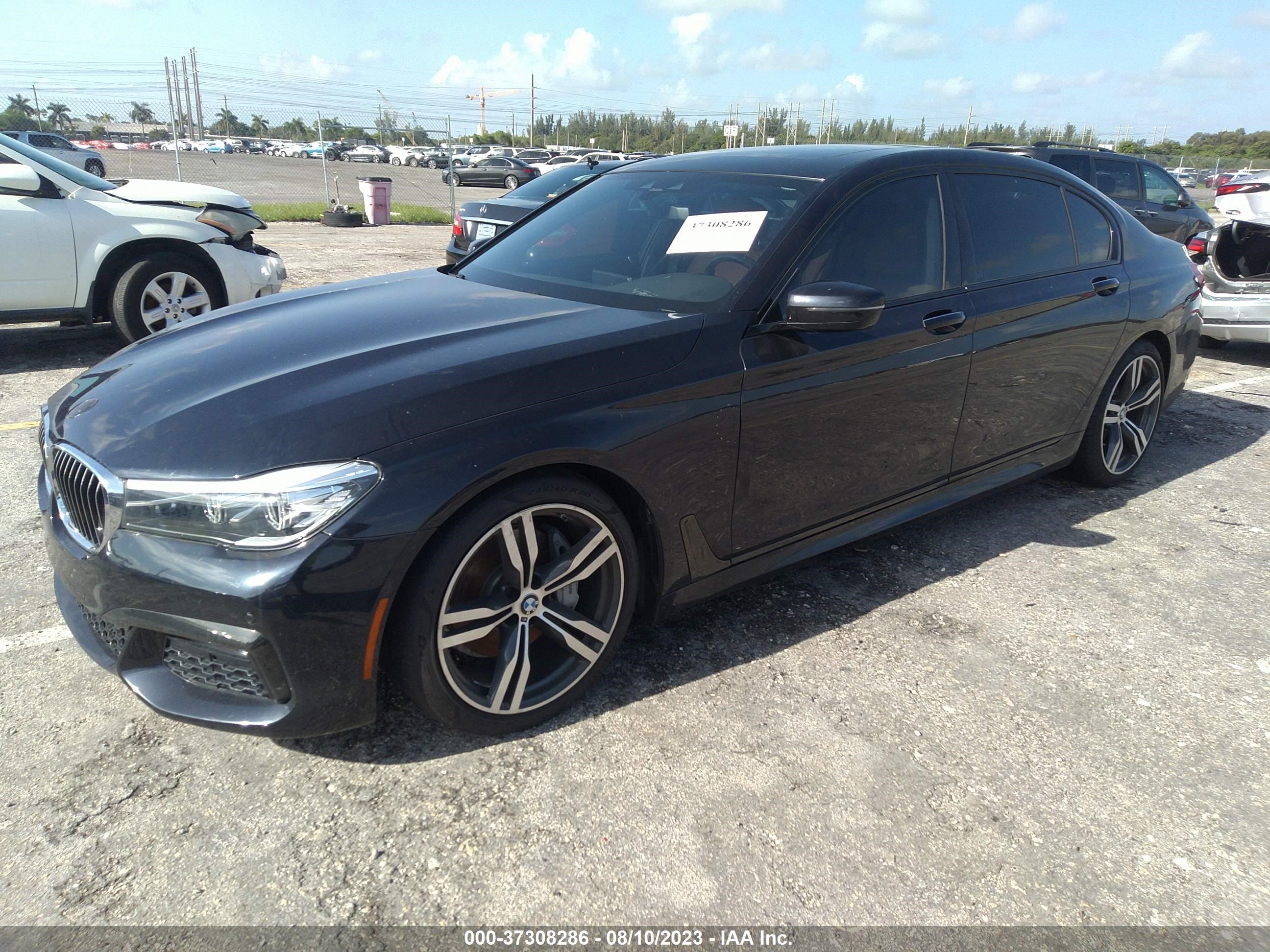 Photo 1 VIN: WBA7E2C57KB217780 - BMW 7ER 