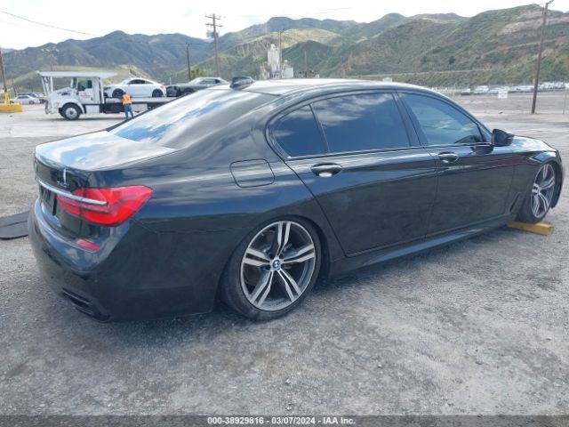 Photo 3 VIN: WBA7E2C59KB454481 - BMW 740I 