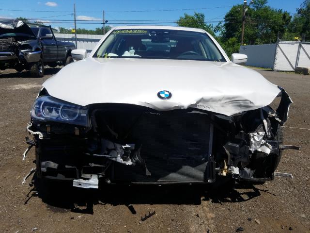 Photo 8 VIN: WBA7E4C54HGU99450 - BMW 740XI 