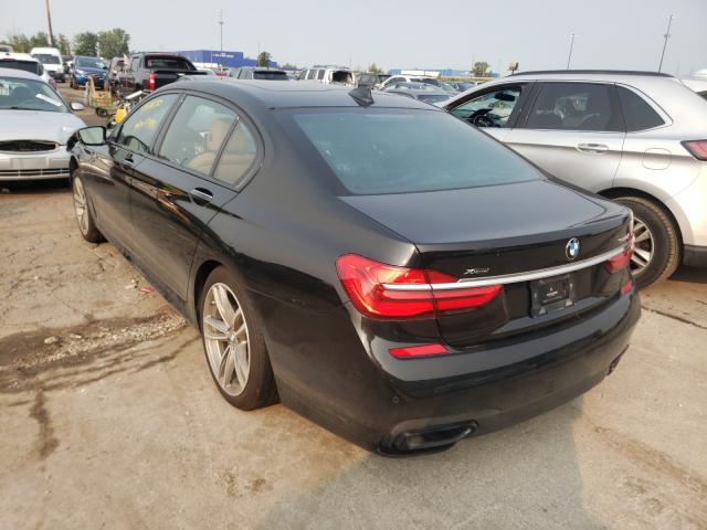 Photo 2 VIN: WBA7E4C57KGV28611 - BMW 740 XI 