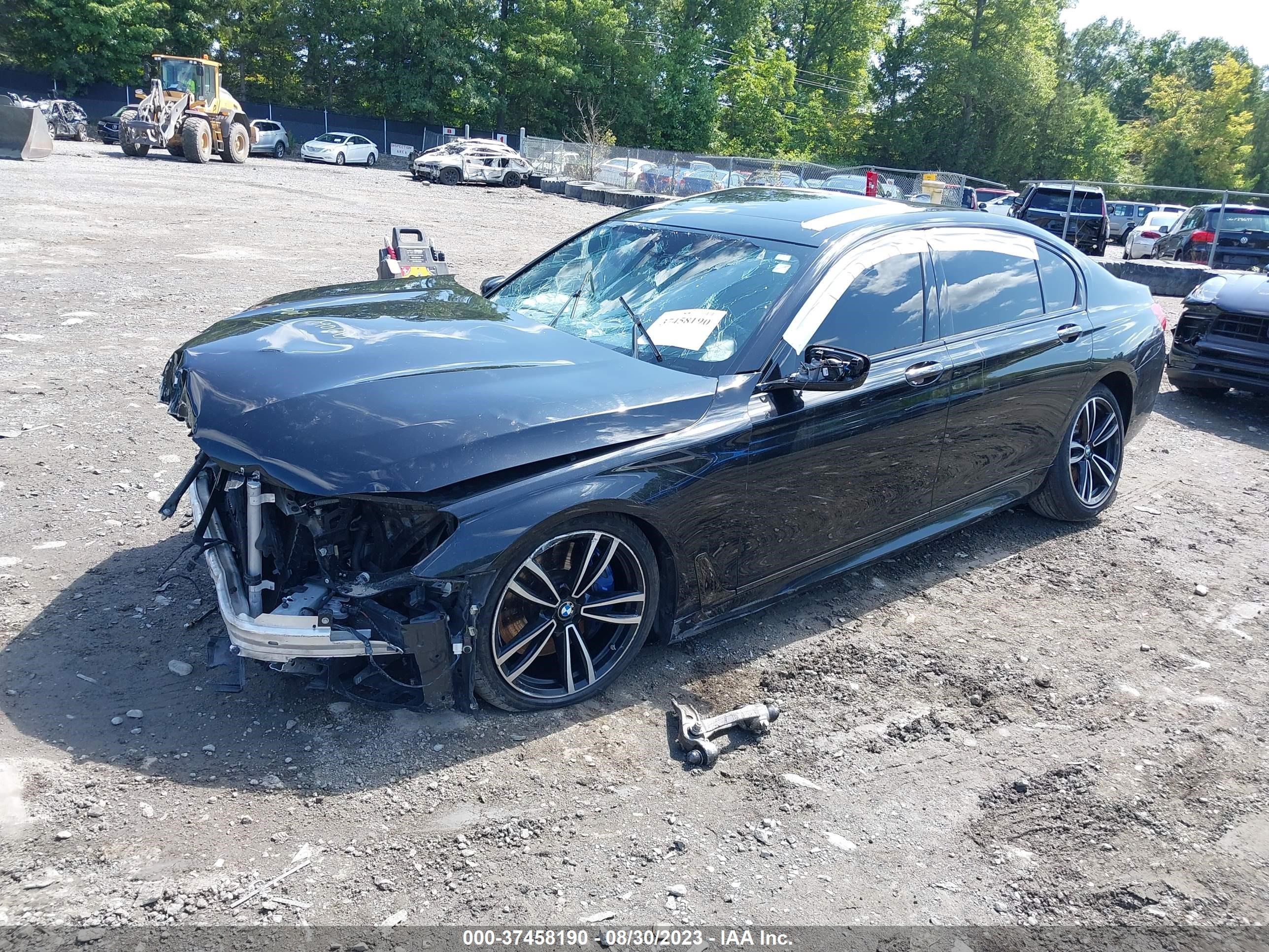 Photo 1 VIN: WBA7E4C59KGV70570 - BMW 7ER 