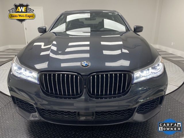 Photo 1 VIN: WBA7F0C54KGM25507 - BMW 750 