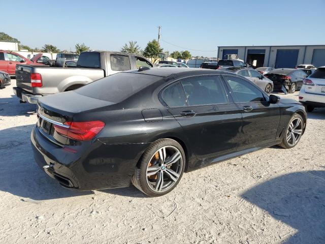 Photo 2 VIN: WBA7F0C57KGM25937 - BMW 750 I 