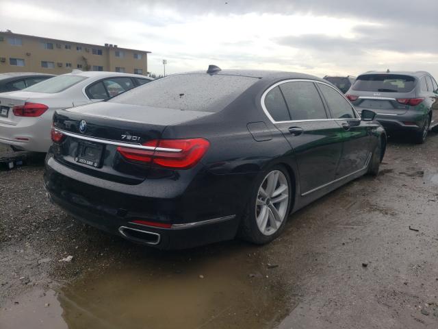 Photo 3 VIN: WBA7F2C50GG416418 - BMW 750XI 