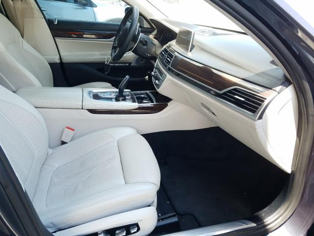 Photo 4 VIN: WBA7F2C50GGE12274 - BMW 750 XI 