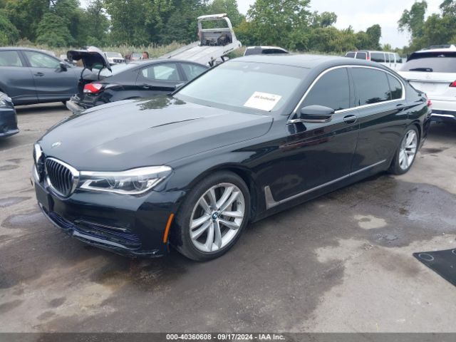 Photo 1 VIN: WBA7F2C52GG418106 - BMW 750I 