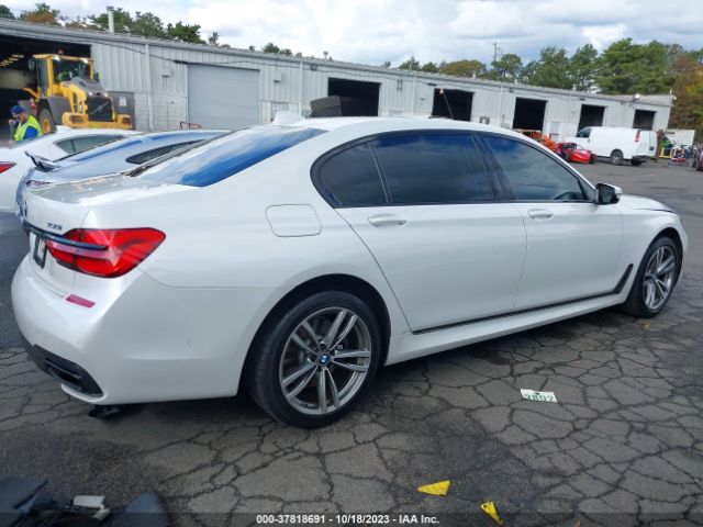 Photo 3 VIN: WBA7F2C54KB239474 - BMW 750I 