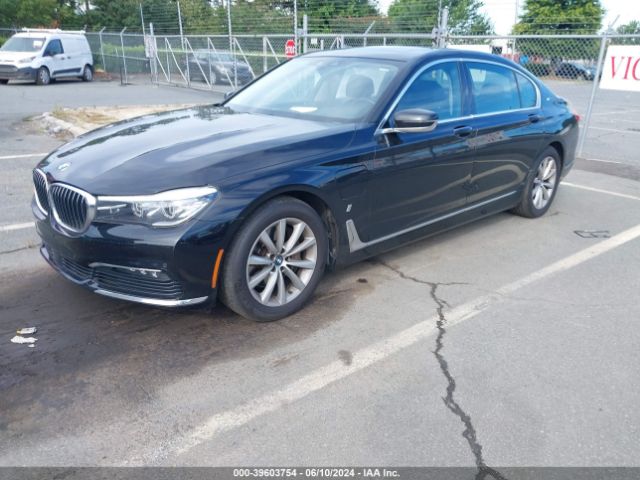 Photo 1 VIN: WBA7J2C50JG497989 - BMW 740E 