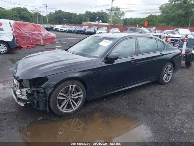 Photo 1 VIN: WBA7J2C54KB246374 - BMW 740E 