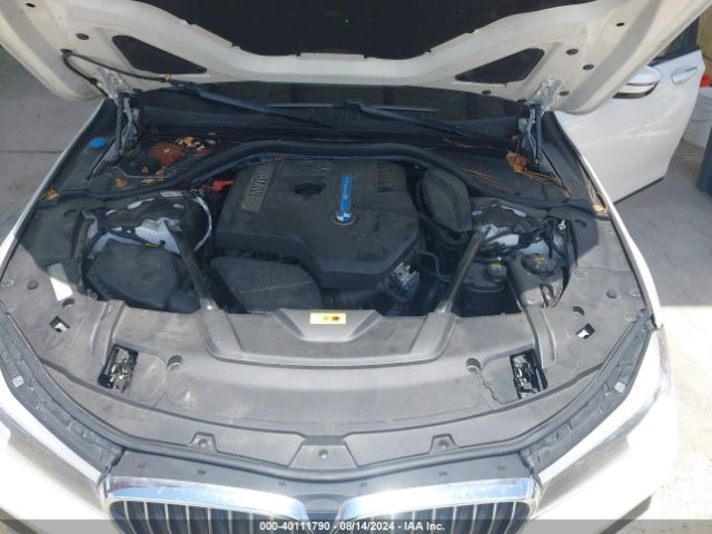 Photo 9 VIN: WBA7J2C57HG497658 - BMW 740E 