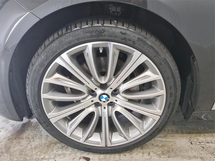 Photo 12 VIN: WBA7R21000CF25847 - BMW 740 