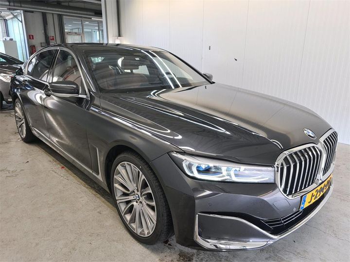 Photo 2 VIN: WBA7R21000CF25847 - BMW 740 