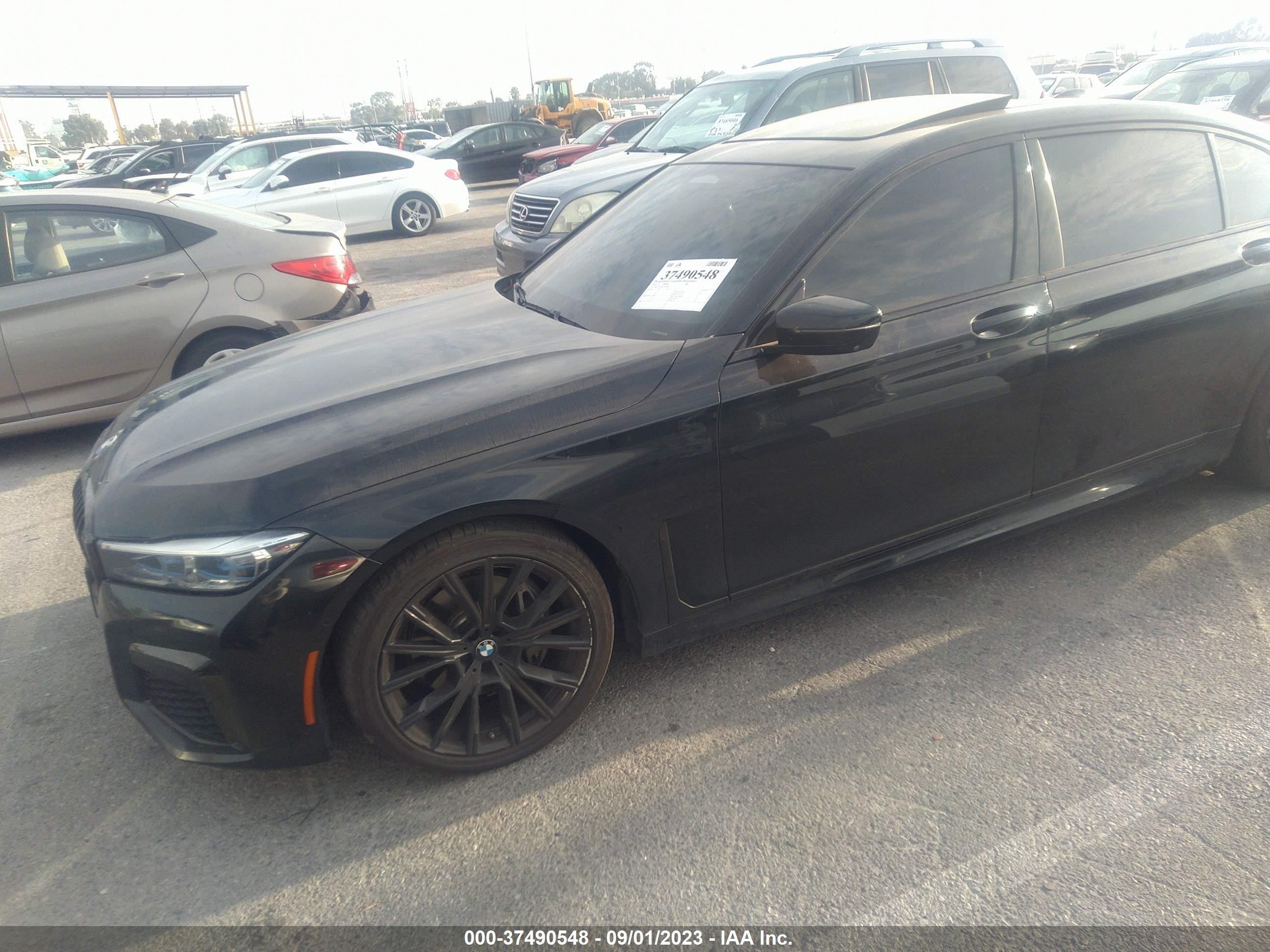 Photo 1 VIN: WBA7T4C08LCE18706 - BMW 7 SERIES 