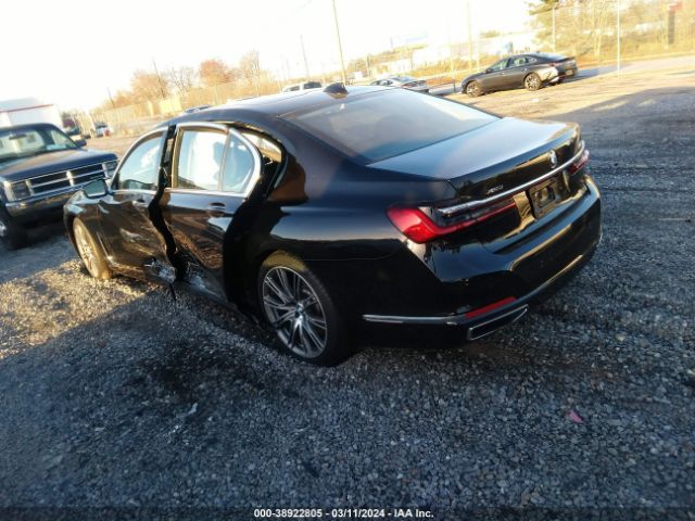 Photo 2 VIN: WBA7U2C08NCH05838 - BMW 750 