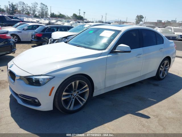 Photo 1 VIN: WBA8B9C5XHK676090 - BMW 330I 