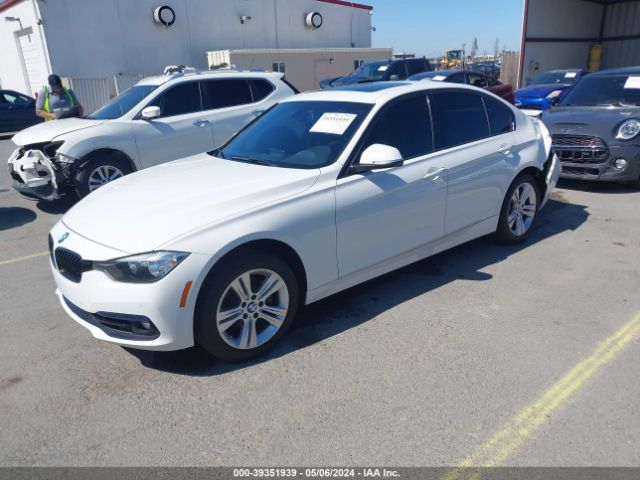 Photo 1 VIN: WBA8B9G37HNU55103 - BMW 330I 